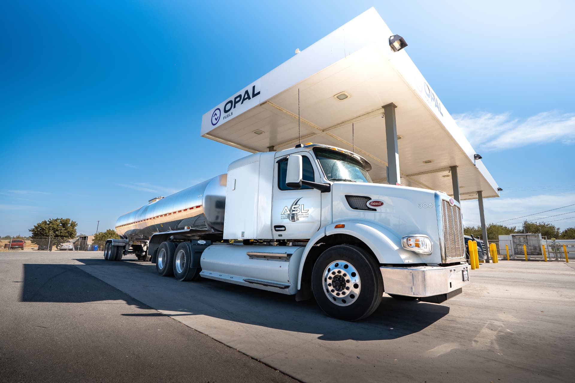All Seasons Logistics milk tanker at an OPAL Fuels station